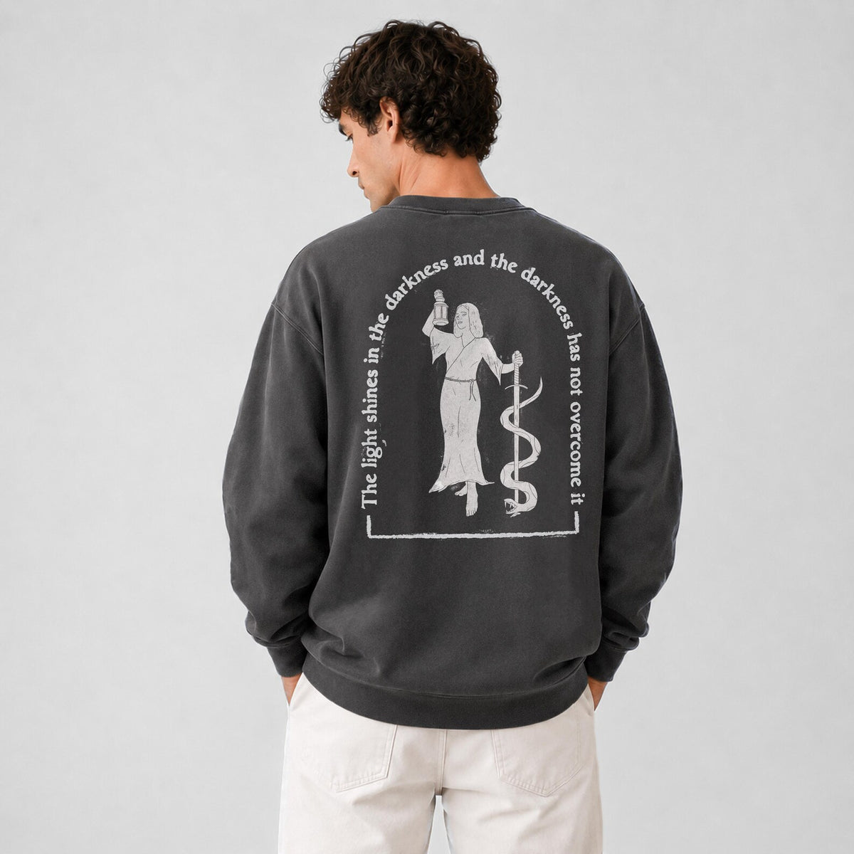 The Light Shines in the Darkness Sweatshirt
