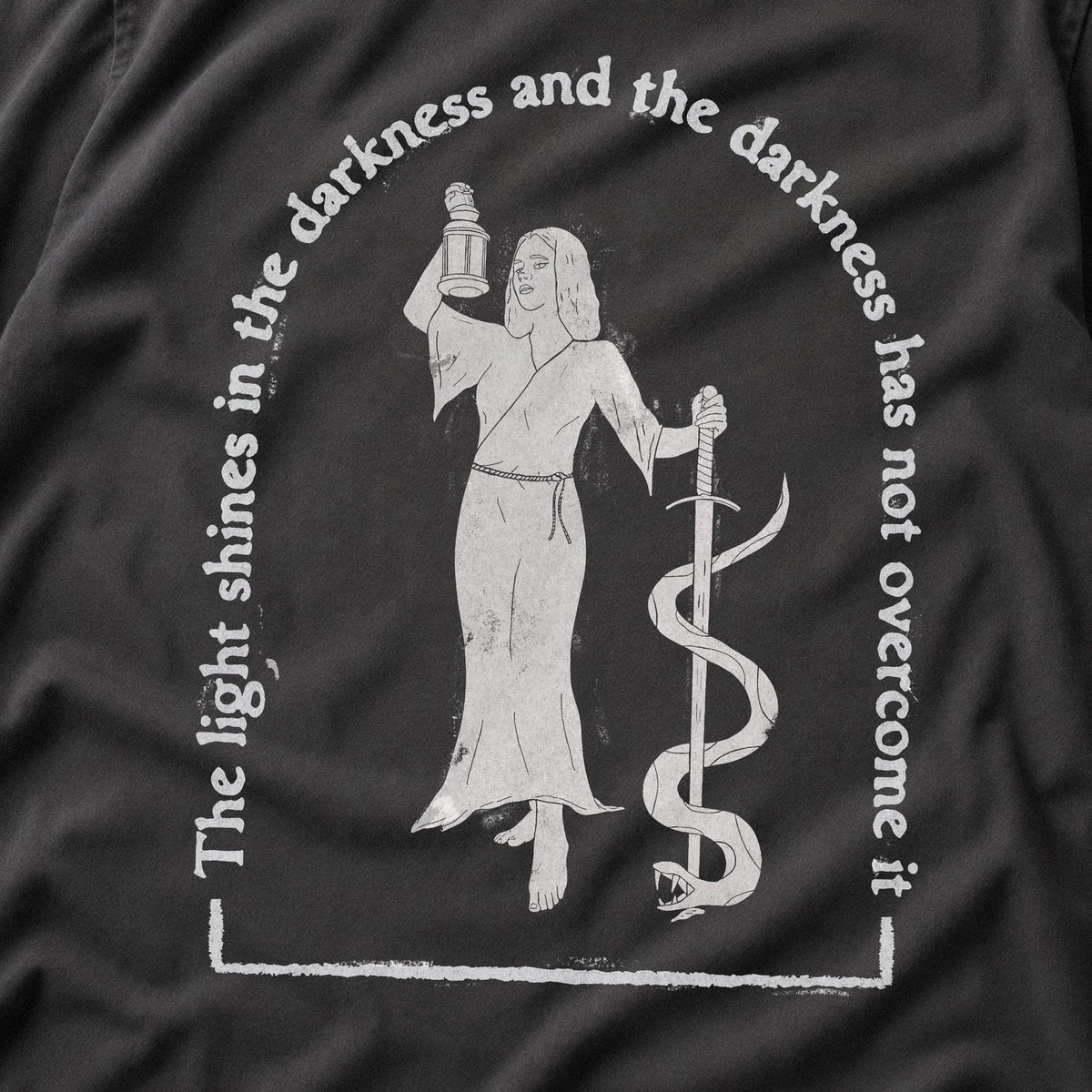 The Light Shines in the Darkness Sweatshirt
