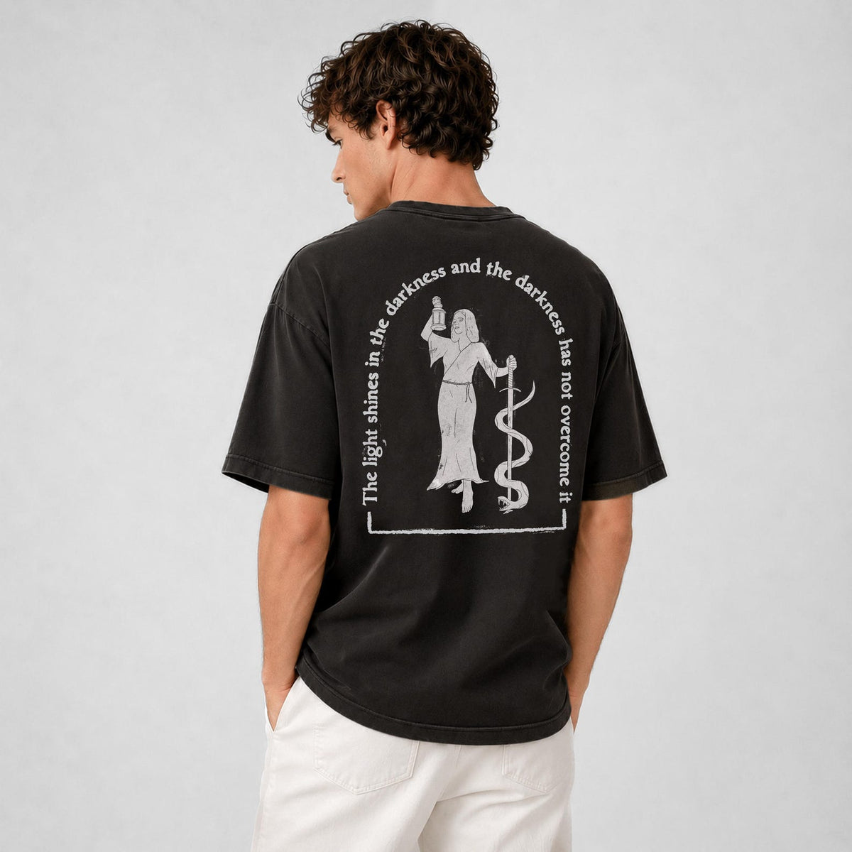 The Light Shines in the Darkness Tee